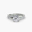 Twisted engagement ring with a cushion cut diamond and micro pave setting on the shank white gold on the white background