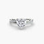 Diamond ring with a heart-shaped center stone on a white background