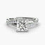 Diamond twisted ring with a princess square-cut center stone micro pave setting on the shank on a white background