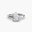 Diamond ring with a pear-shaped gemstone on a white background