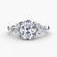 Oval diamond engagement ring three marquise on the side on a white background
