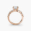 Rose gold ring with a diamond on a white background