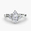 Marquise diamond solitaire ring with two side stone, white gold on a white background