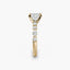 Gold ring with a diamond on a white background