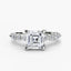 White gold ring with a large Asscher-cut diamond and smaller diamonds on the band marquise and round on a white background