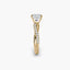 Gold ring with a diamond on a white background