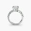 Diamond ring with a central diamond and baguette-cut side stones on a white background