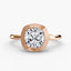 Cushion cur bezel set ring in rose gold solitaire setting