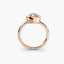Cushion cur bezel set ring in rose gold solitaire setting