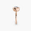 Cushion cur bezel set ring in rose gold solitaire setting