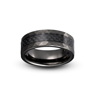 Black carbon fiber ring on a white background