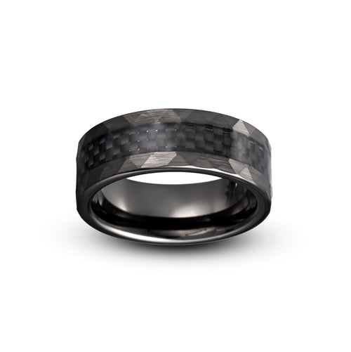 Black carbon fiber ring on a white background