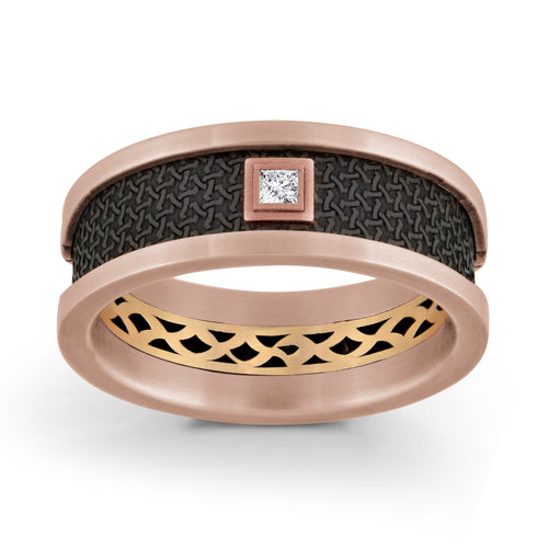 Rose gold ring with diamond and textured carbon fiber design 