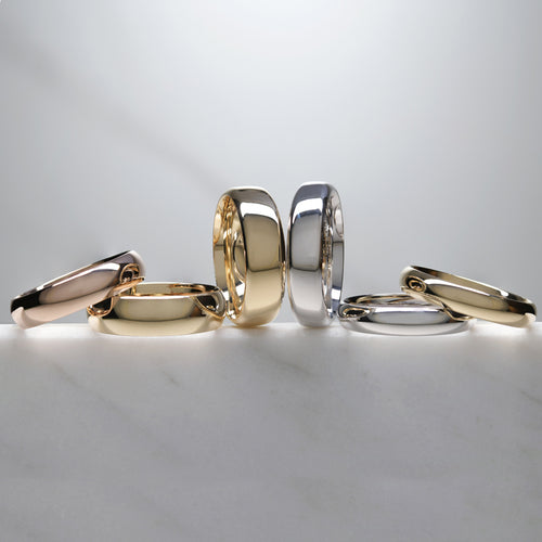 Set of plain rose gold yellow and platinum rings