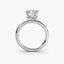 Front-facing view of the Solaris cushion-cut diamond solitaire engagement ring in 14k white gold, showcasing the eight-prong tulip basket setting and plain rounded band against a light gray background.