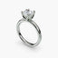 Solaris cushion-cut diamond solitaire engagement ring in 14k white gold with an eight-prong tulip-style cathedral setting, viewed from a three-quarter angle against a light gray background.