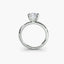 Side view of The Seris showing cushion cut diamond in secure double prong setting white gold