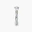 Diamond ring with a twisted pave shank on a white background