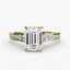 Gold ring with a large emerald cut diamond and smaller round diamonds on the band against a white background