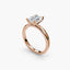 Side view of The Sylvene showing emerald cut diamond ring in balanced double prong rose gold setting