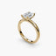 Side view of The Sylvene showing emerald cut diamond in balanced double prong yellow gold setting 