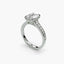 Diamond ring with a central gemstone on a white background