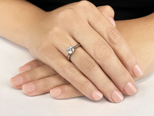 Celestial Embrace Round Diamond Solitaire Engagement Ring