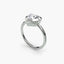 Heart-shaped diamond bezel ring with white gold solitaire setting 