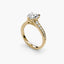 Gold ring with a diamond on a white background