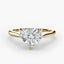 Solitaire gold ring with a heart-shaped diamond