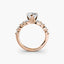 Rose gold diamond ring on a white background