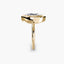Profile view of The Novara showing marquise diamond in protective yellow gold bezel with pointed ends secured
