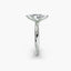 Profile view of The Caelora showing marquise diamond with protected pointed ends in double prong setting in white gold