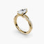 Gold ring with a marquise-shaped diamond twisted-band on a white background