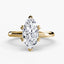 The Caelora marquise cut diamond double prong solitaire engagement ring in yellow gold