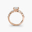 Rose gold ring with a diamond on a white background