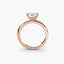 Side view of The Caelora showing marquise diamond with protected pointed ends in double prong rose gold setting