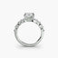 Diamond ring with a marquise-shaped center stone on a white background