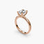 Side view of The Alaria showing oval diamond secured with double prong setting rose gold
