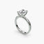 Side view of The Alaria showing oval diamond secured with double prong setting white gold