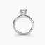 Side view of The Alaria showing oval diamond secured with double prong setting white gold