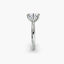 Profile view of The Alaria showing oval diamond secured with double prong setting