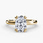 The Alaria oval cut diamond double prong solitaire engagement ring in yellow gold