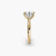 Profile view of The Alaria showing oval diamond secured with double prong setting yellow gold