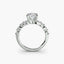 Diamond ring with a oval-shaped center stone on a white background