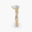 Gold ring with a diamond on a white background