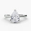 Pear-shaped diamond solitaire ring in white gold on a white background