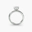 Side view of The Zevara showing pear cut diamond with protected point in double prong setting