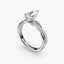 Diamond ring with a clear gemstone on a white background