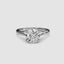 White Gold solitaire ring with a round diamond brilliant cut on a white background